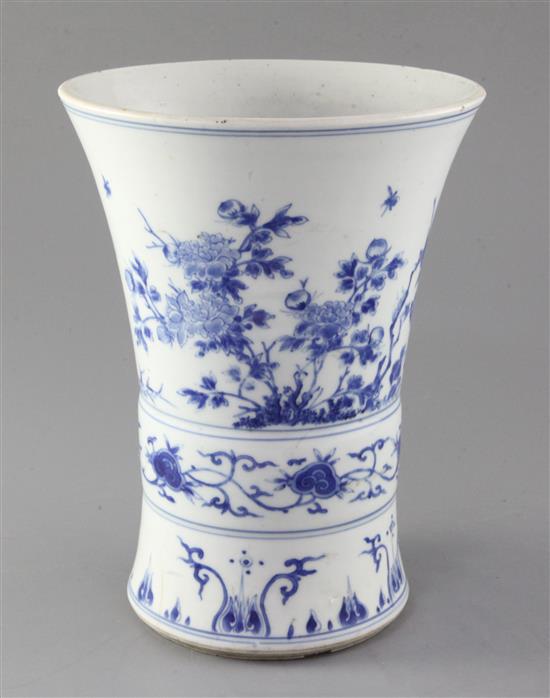 A Chinese blue and white gu-shaped vase or brush pot, Transitional period, mid 17th century, height 24.5cm, diameter 18.5cm, firing cra